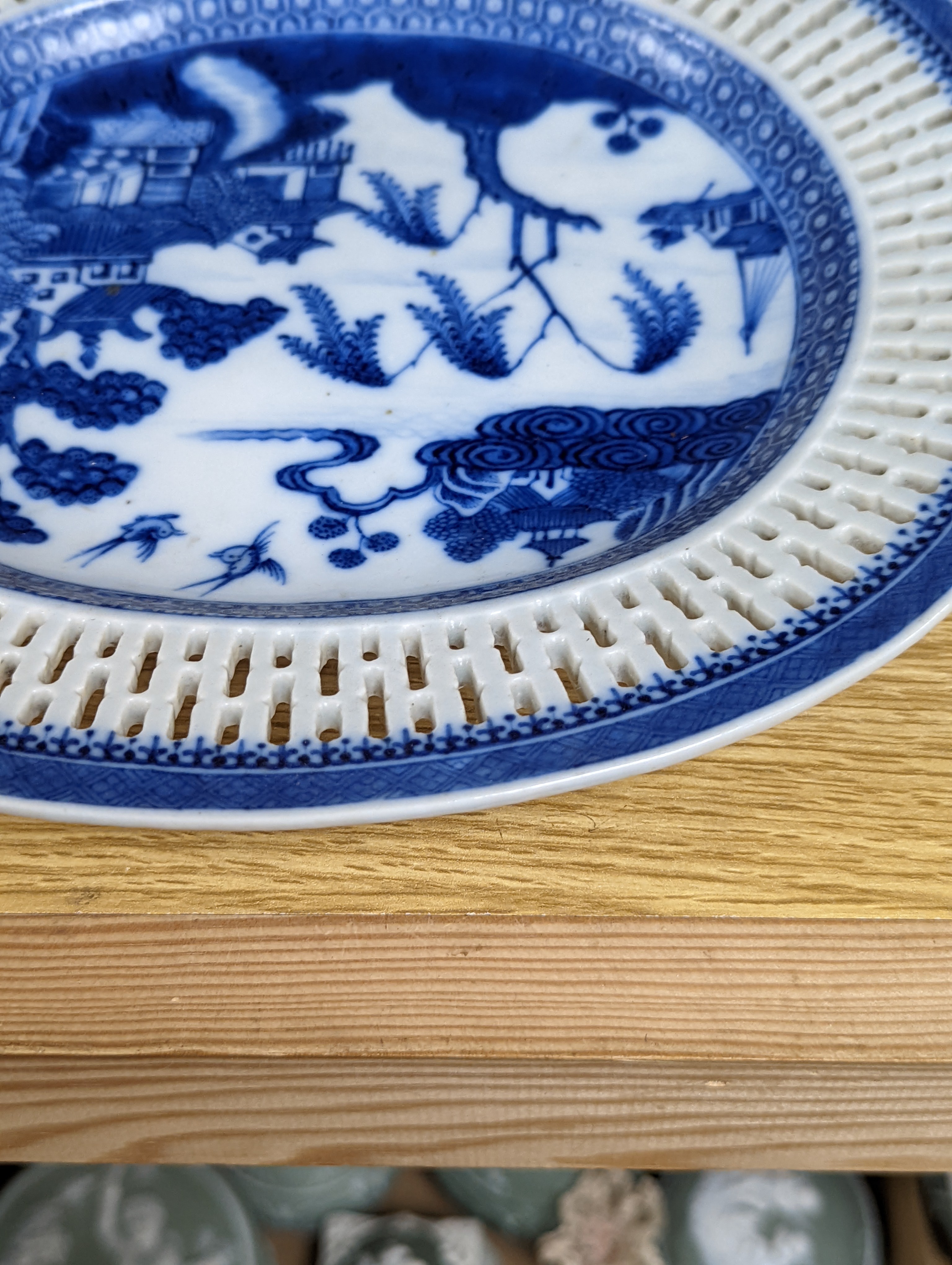 A Chinese blue and white chestnut basket and stand, Qianlong period, basket 11 cms high.
